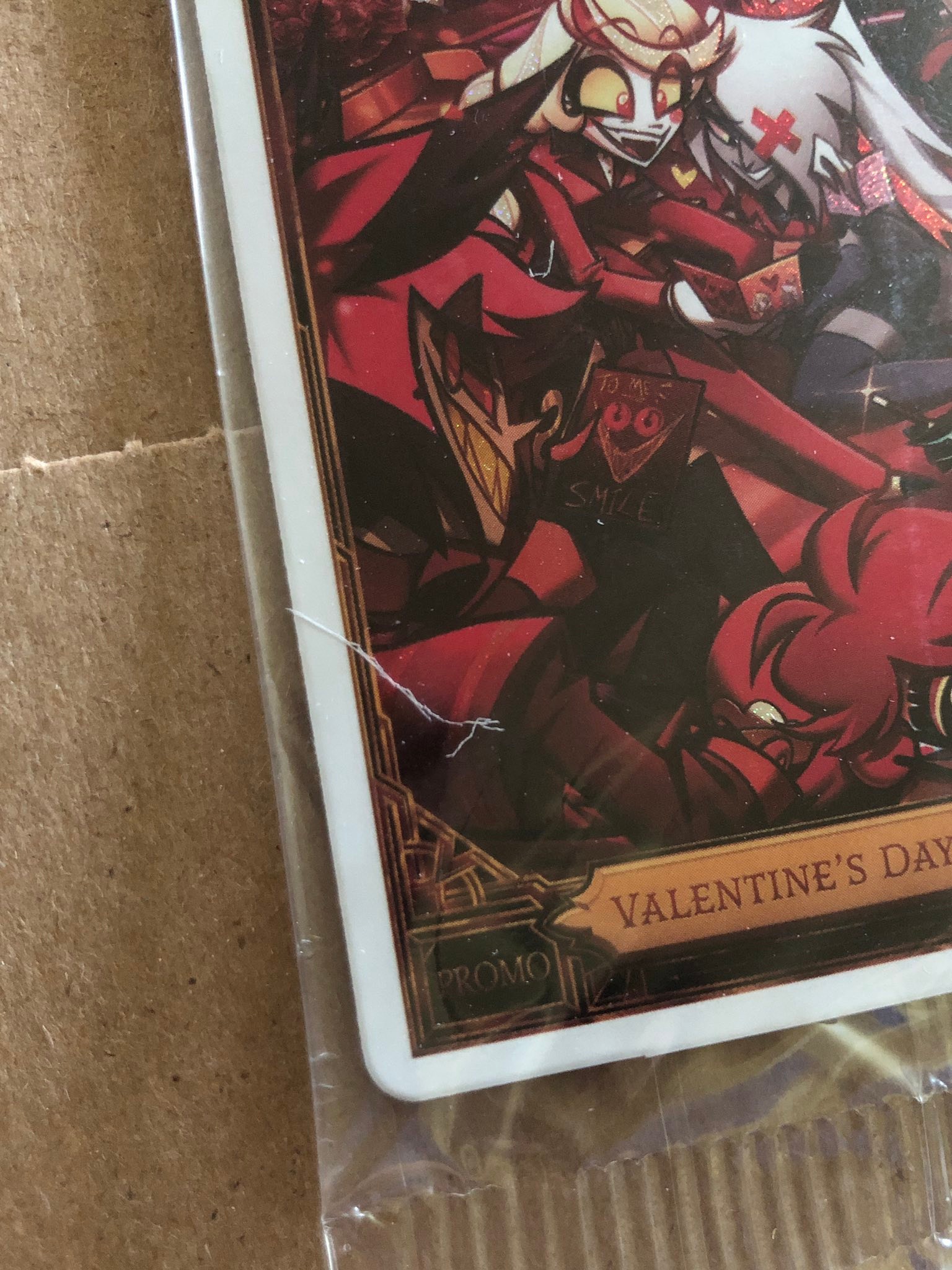 Hazbin Hotel Valentine's Day trading cards with scratches