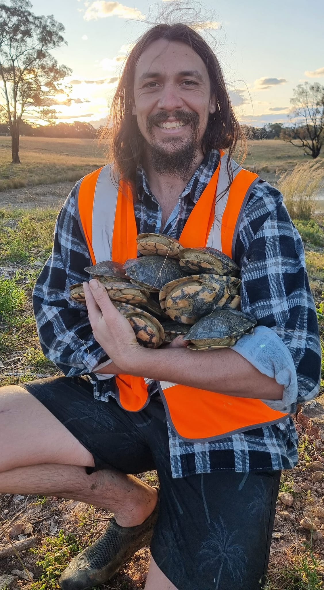 That's a whole hug full of turtles! 🐢... - Wild Conservation