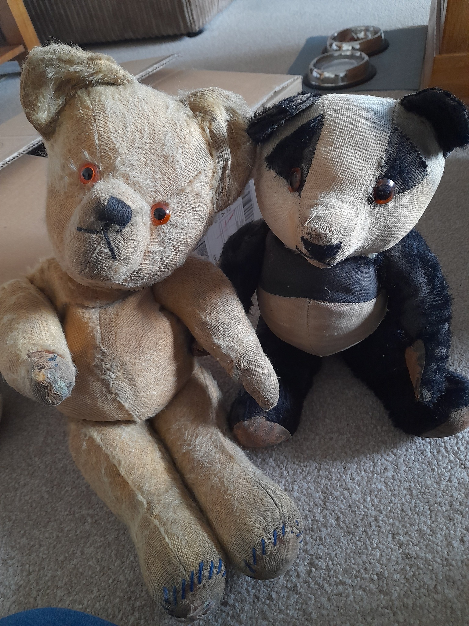 What are these vintage teddy bears with distinct features?