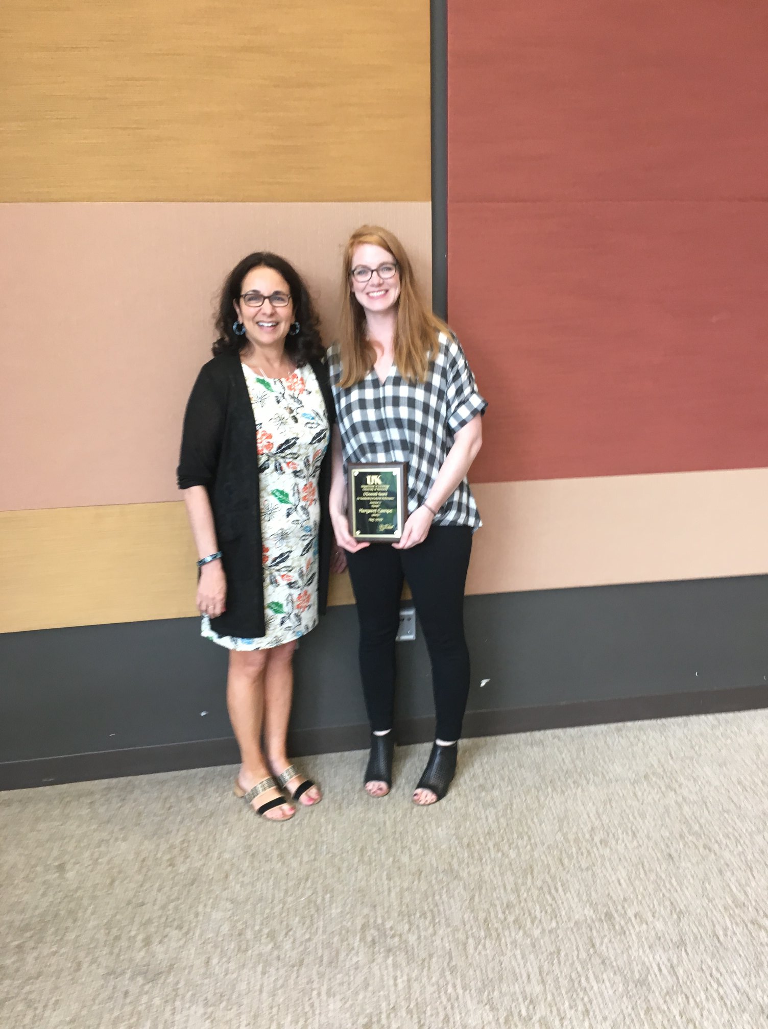 University - Dr. Claire Renzetti presenting Dr. Maggie Campe with the O ...