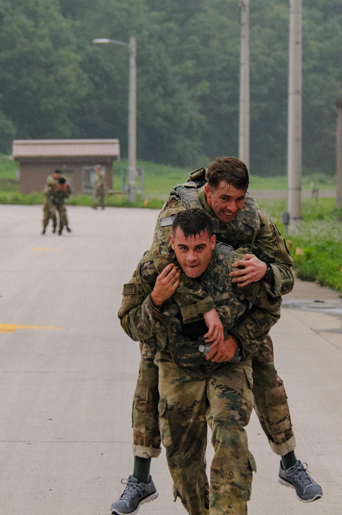 2nd Infantry Division - Soldier carries his teammate simulating ...