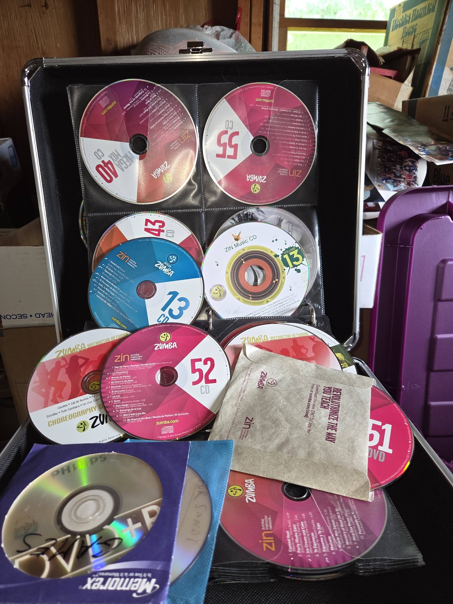 Finding my original Zumba CDs and rubber bracelets from way back