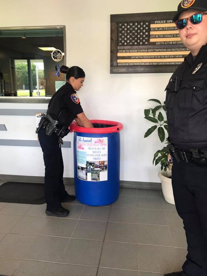 Angleton Police Department - Officers Slawson and Segura help unload ...