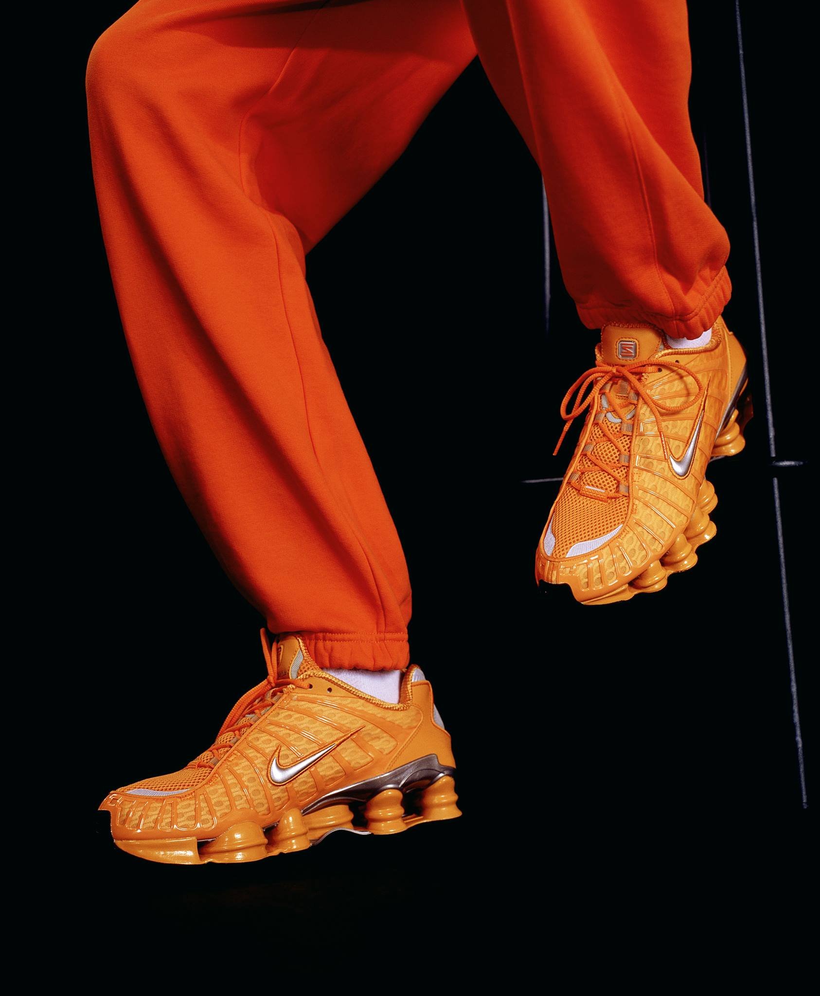 The Nike Shox TL in Clay Orange (online exclusive), Speed Red 