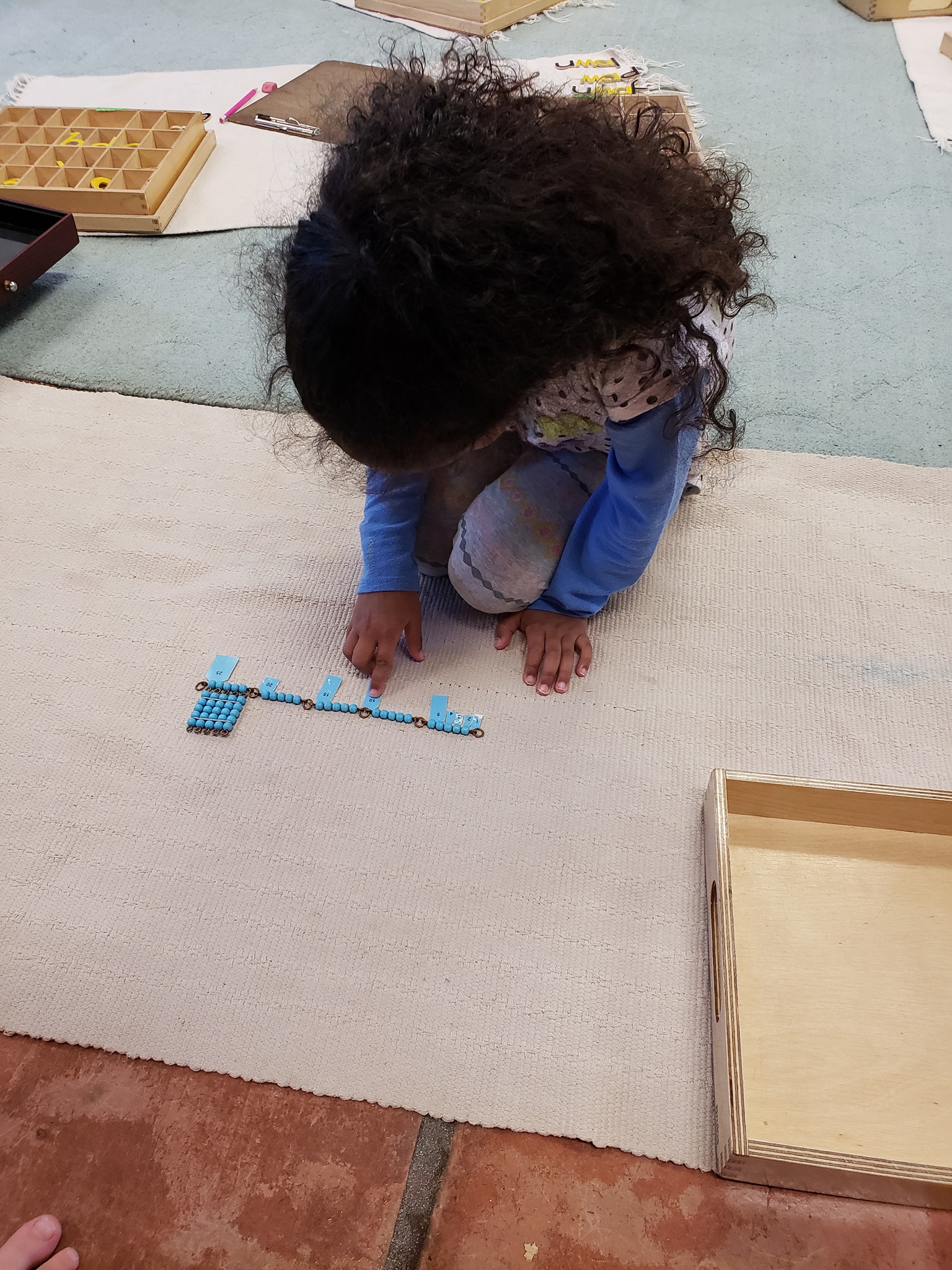 Hard work inside of the... - Cave Creek Montessori School