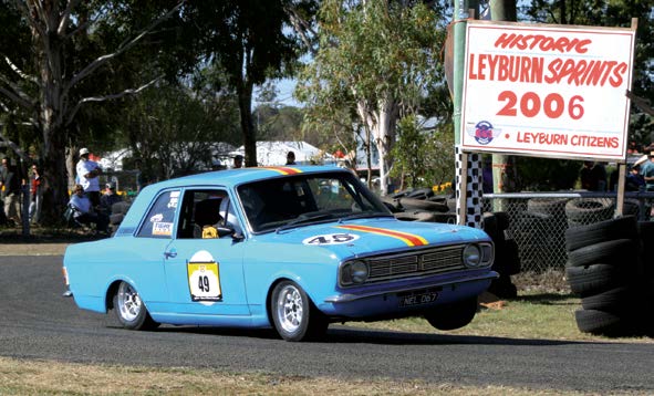 Race Magazine - Neil Lewis corners on three wheels in his...