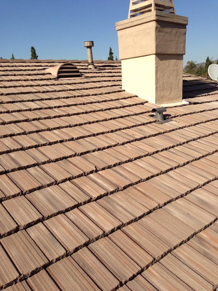 This is a flat tile relay I... - Alas & Bravo Roofing Company