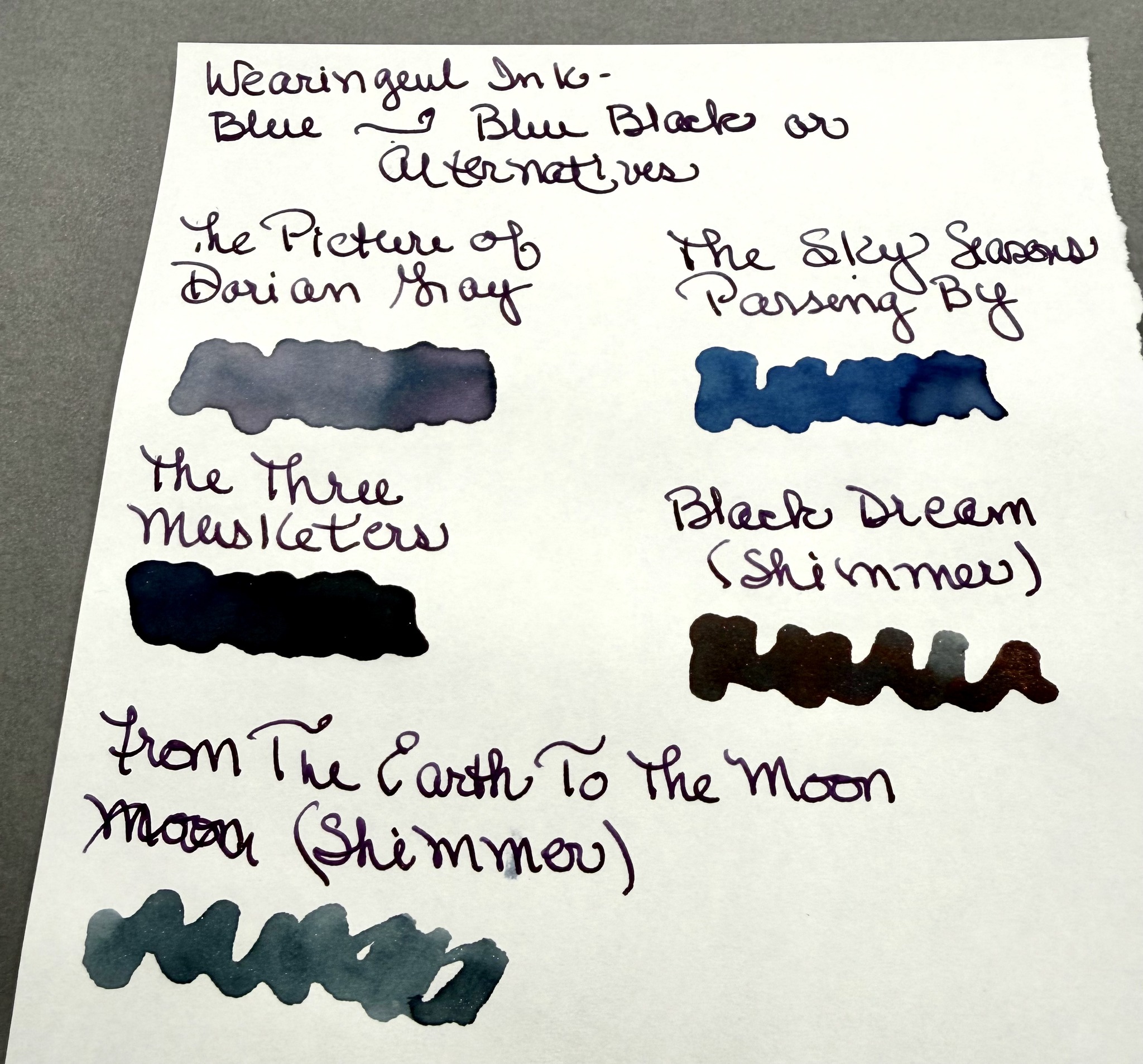 Blue to blue-black ink swatches on Midori paper