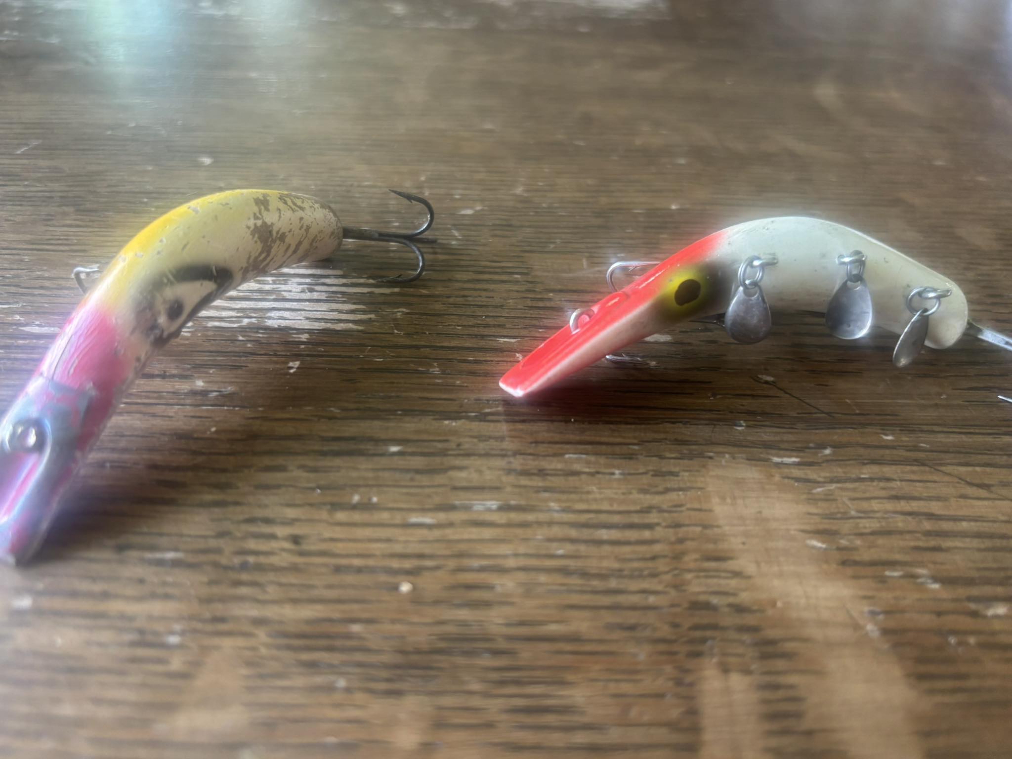Identifying Ike fishing lures with wooden and metal bodies