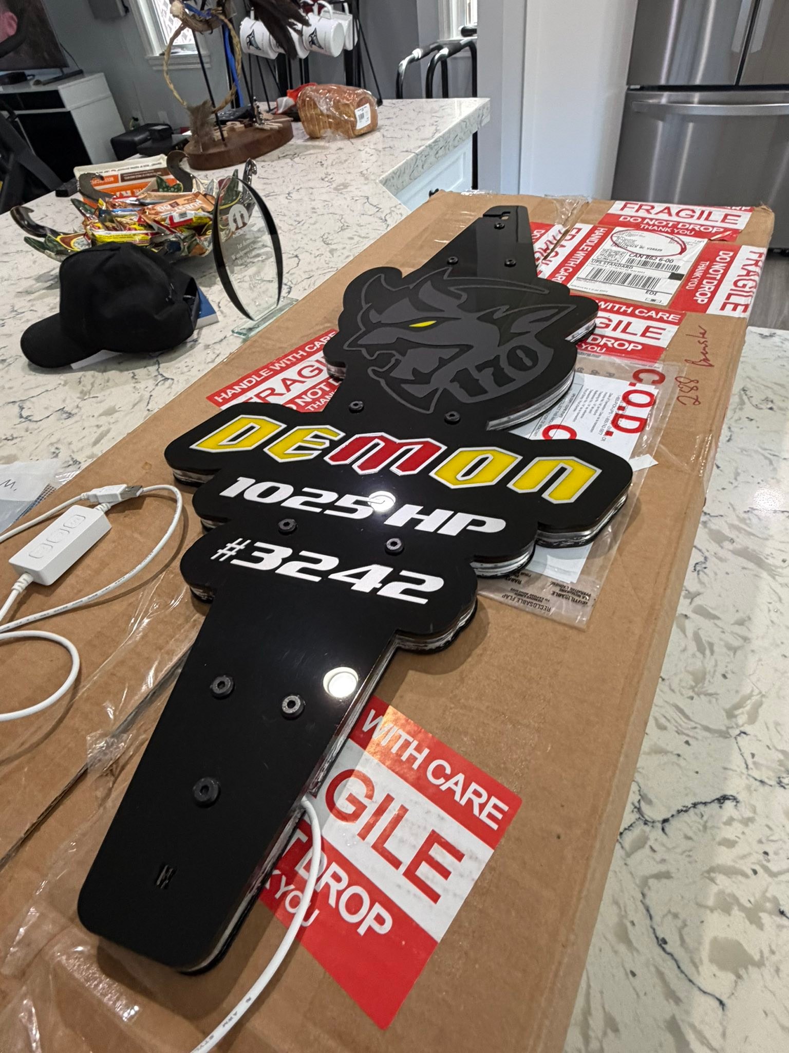 Demon 1025 HP sign at competitive event