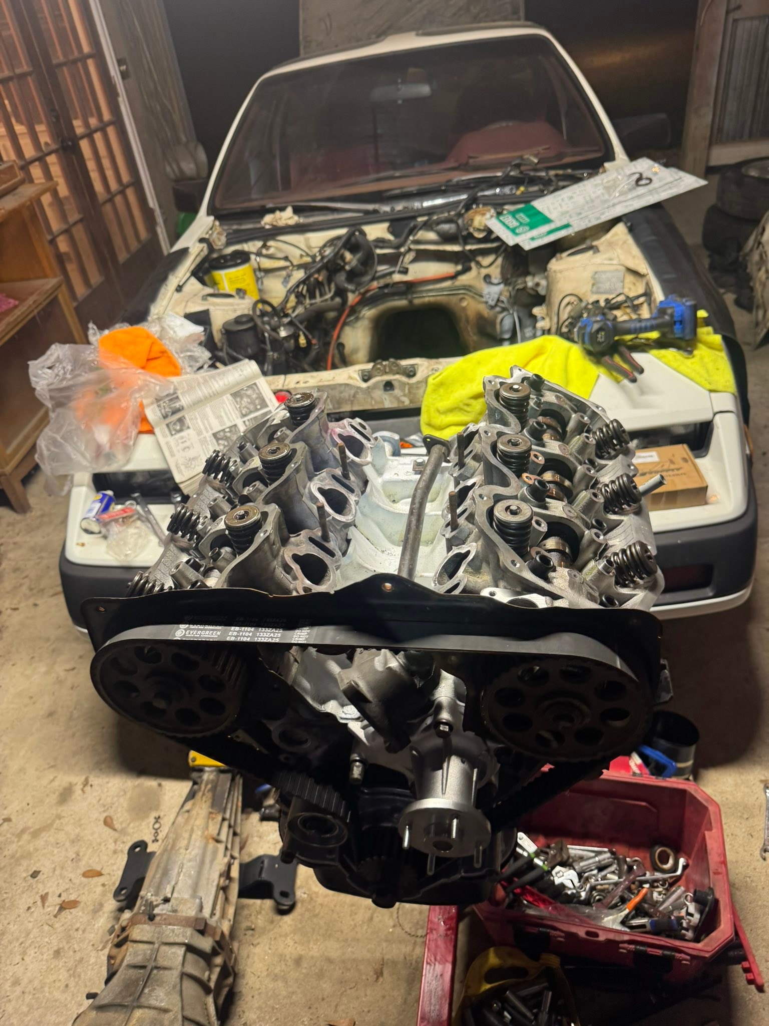 What is the correct timing belt tension for 1985 NA?