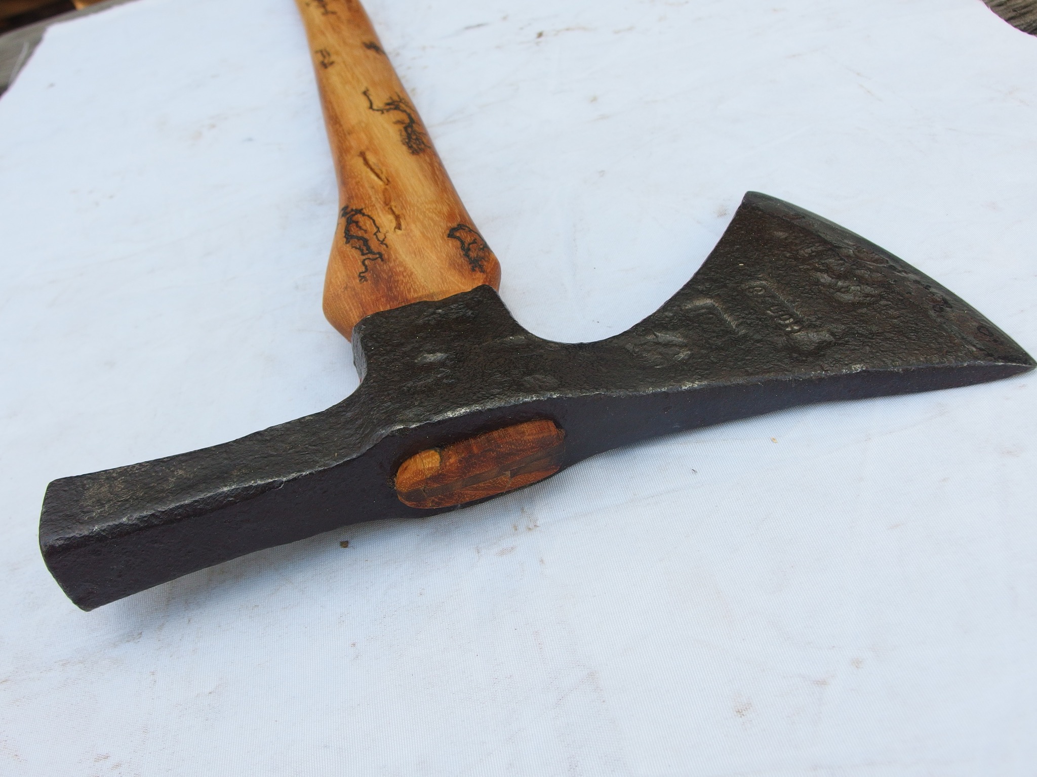 What is the manufacturer of this 19th century French axe?