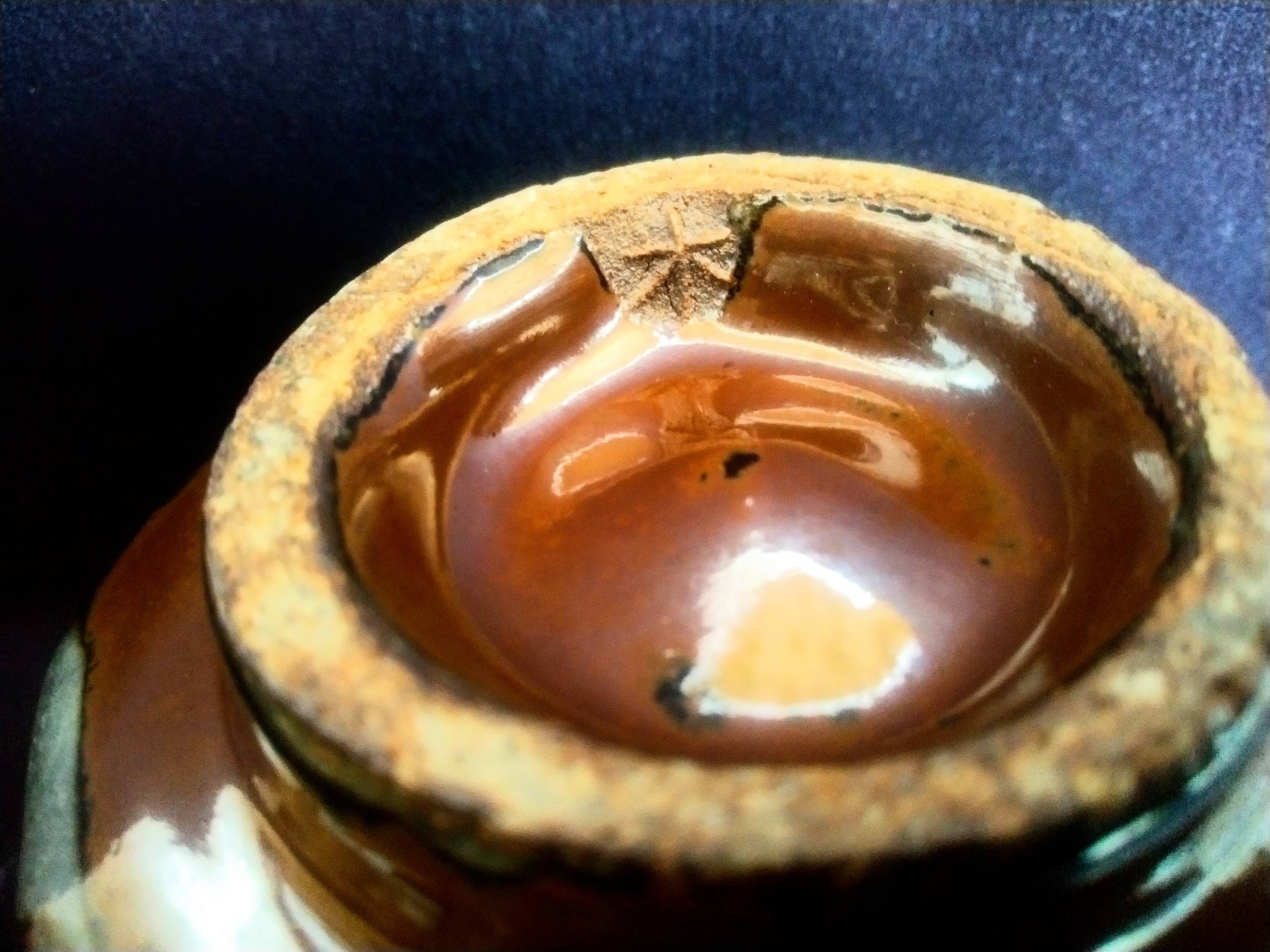 益子の作家、木村一郎柿釉薬の茶碗です。