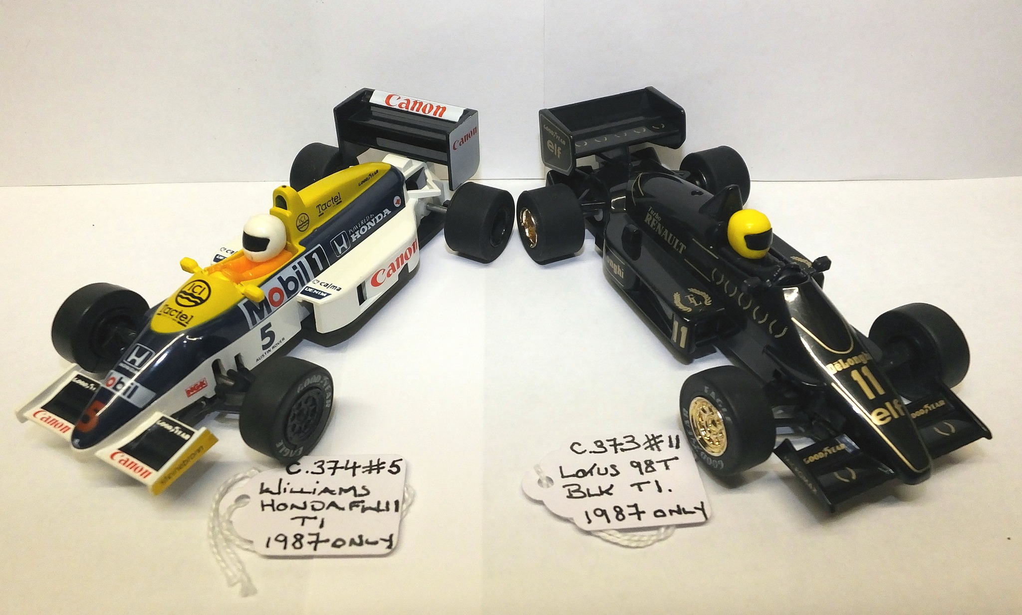 Here's a couple of re-liveries done on Scalextric Williams FW15C