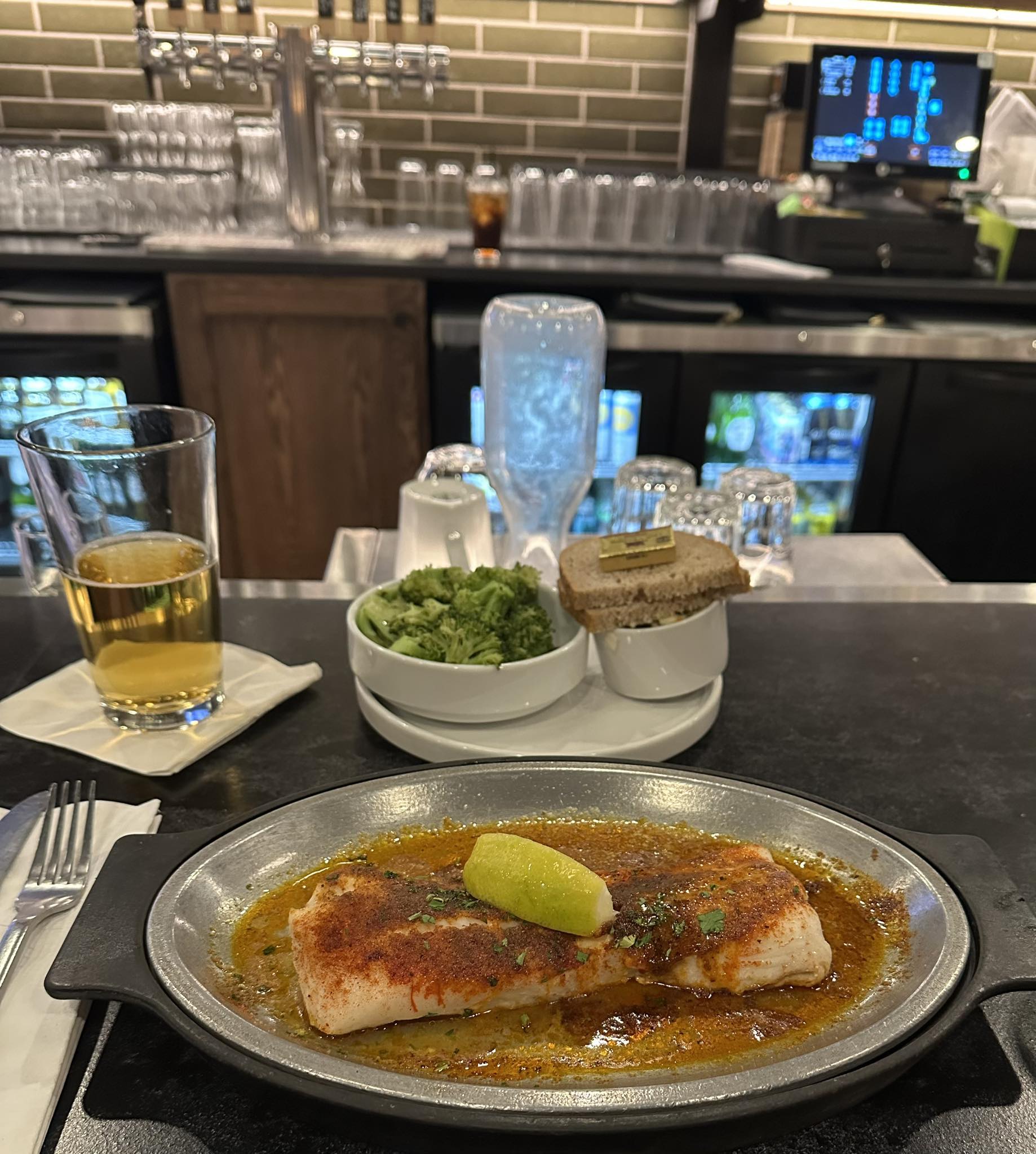 Delicious baked and blackened cod with steamed broccoli