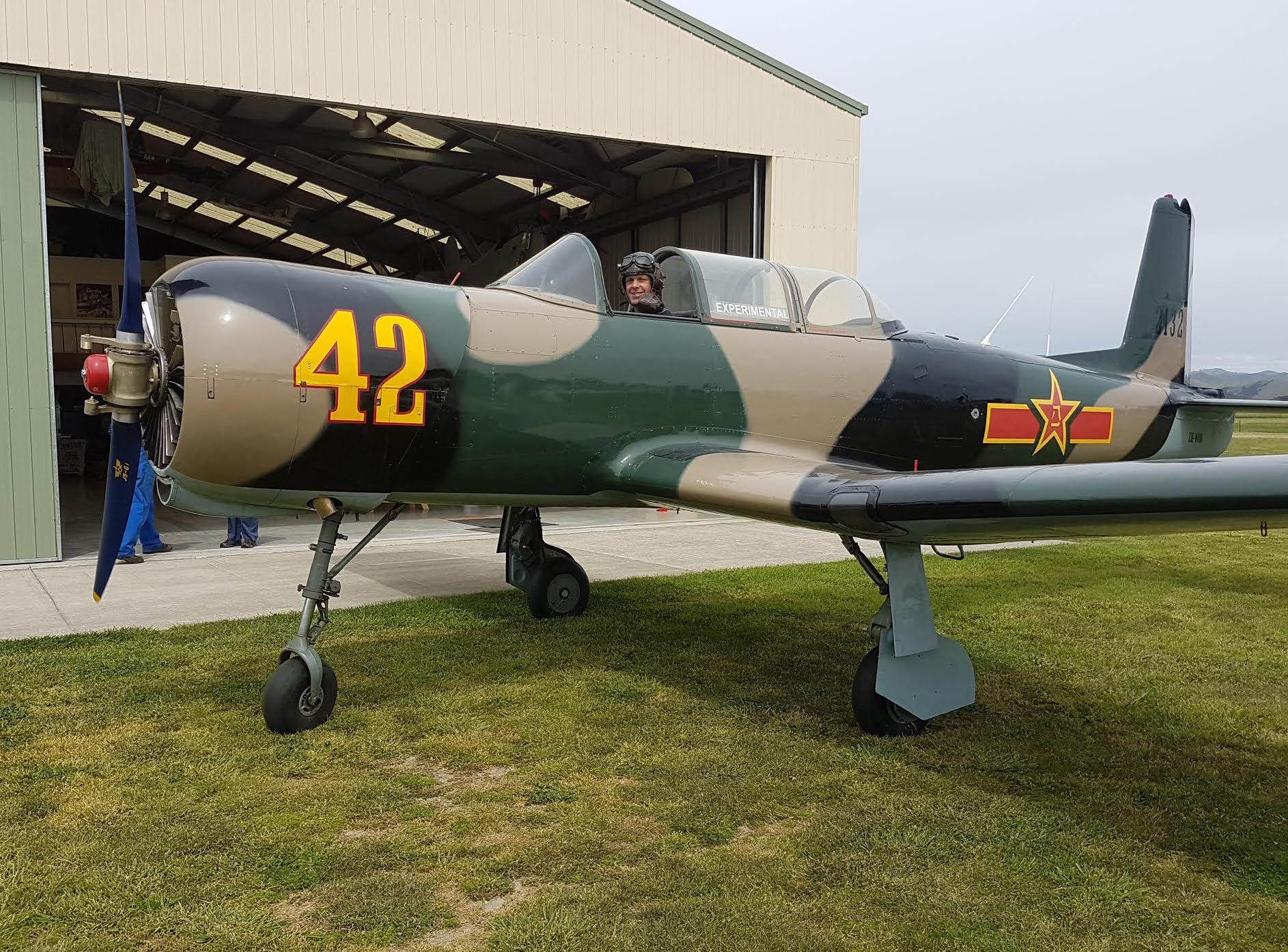 BIRDS OF A FEATHER! These two Nanchang CJ-6as are very special. In