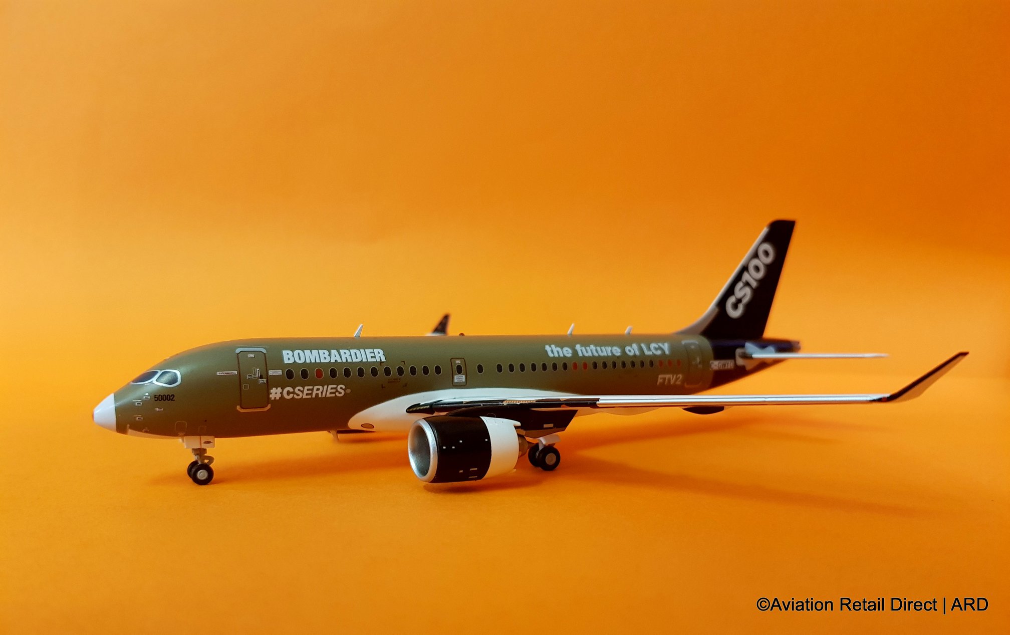 LH2161 | JC WINGS 1:200 | BOMBARDIER CS100 HOUSE COLOURS C-GWYD