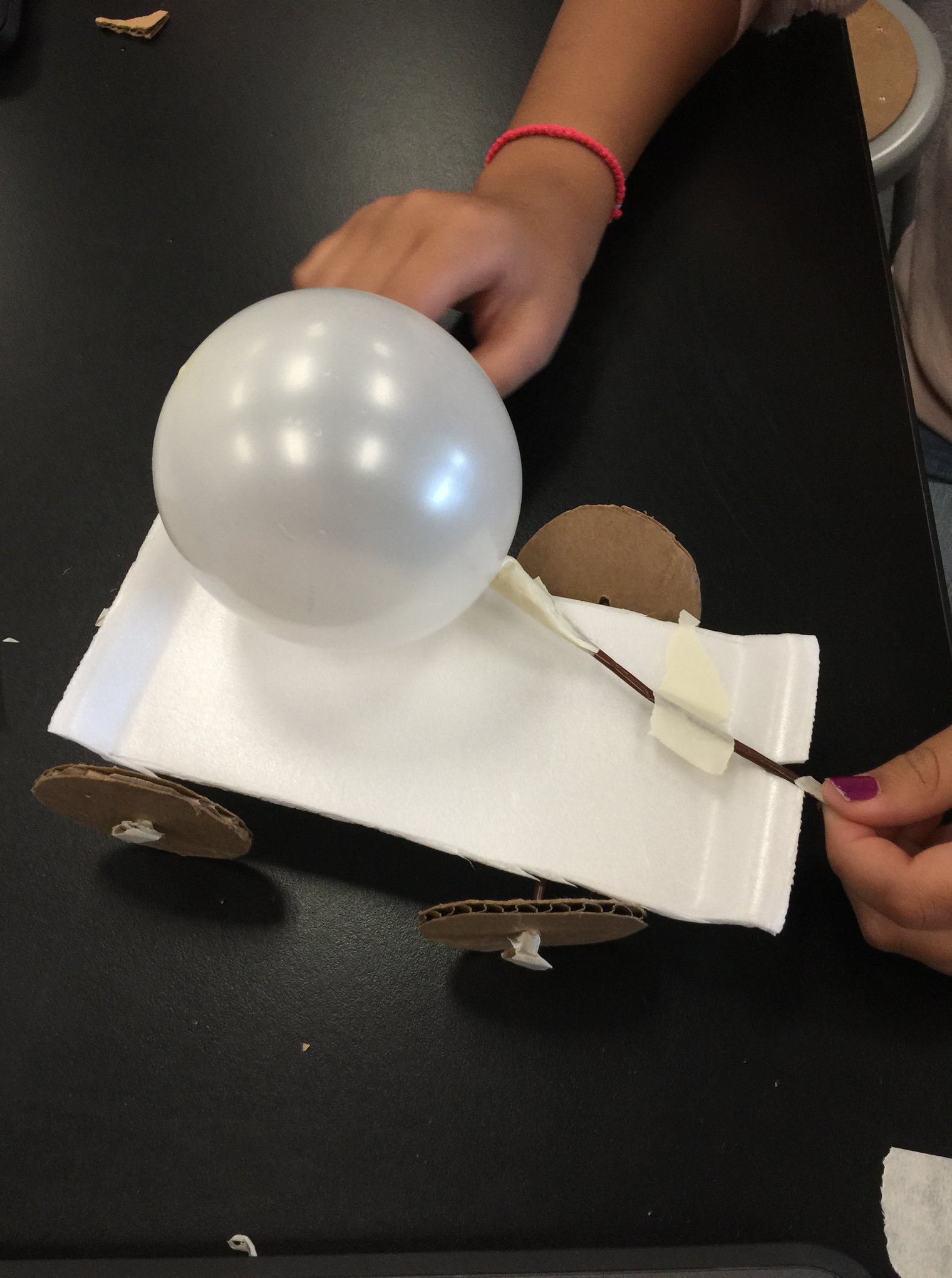 Grade 6 making balloon racers... - Christ the Teacher School
