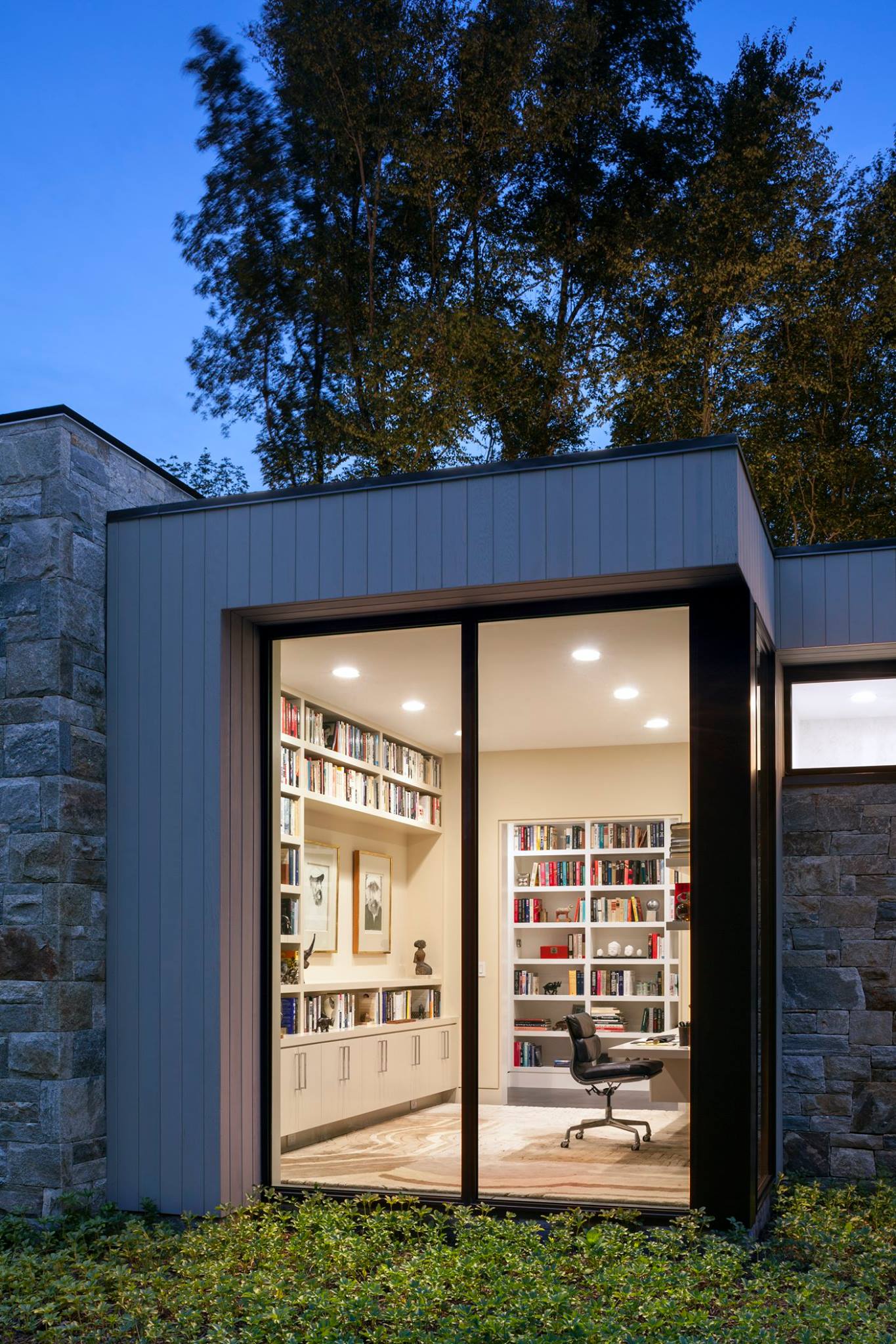 An exterior look at a modern glass... - Chairish By Design