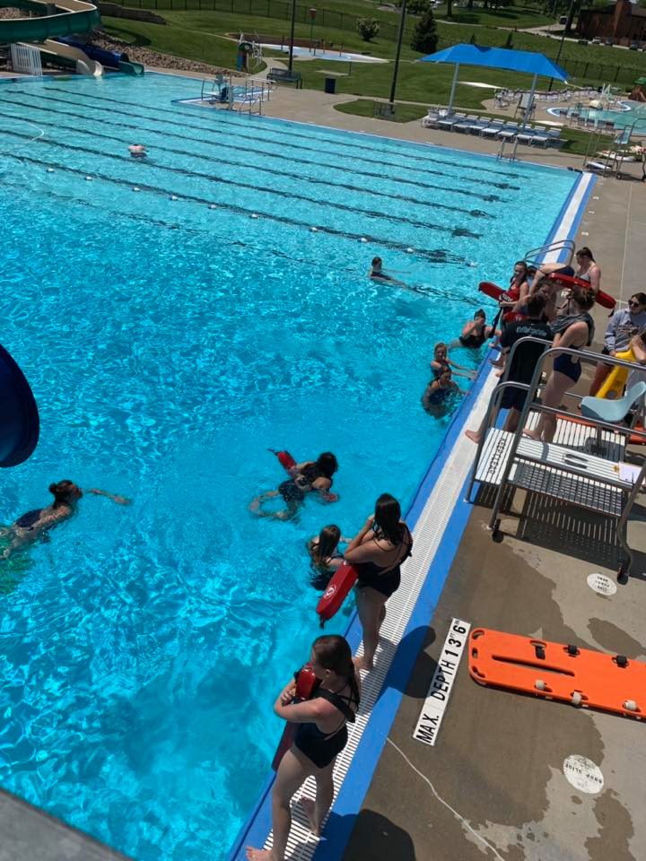 Clive Aquatic Staff reviewing their... - Clive Aquatic Center
