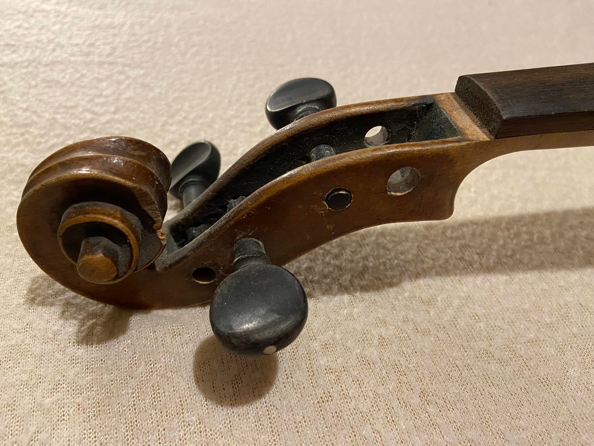 Is this a genuine Stainer violin and what's its value?