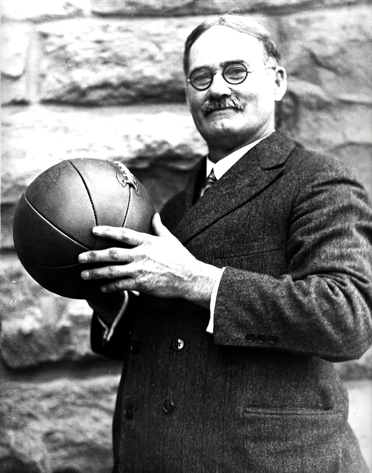The origin of basketball in 1891 by James Naismith