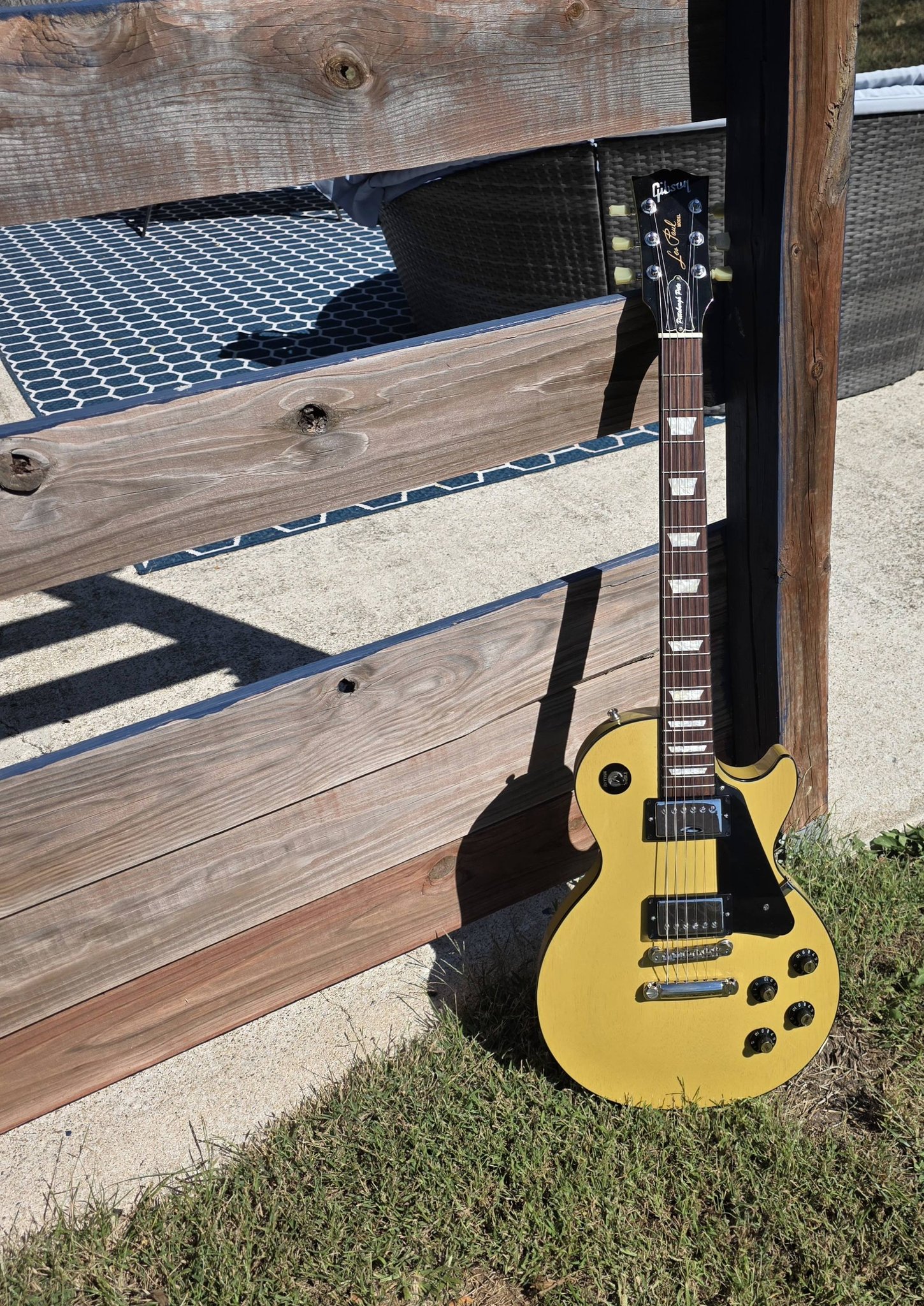 TV Yellow finish on Les Paul guitars in sunlight