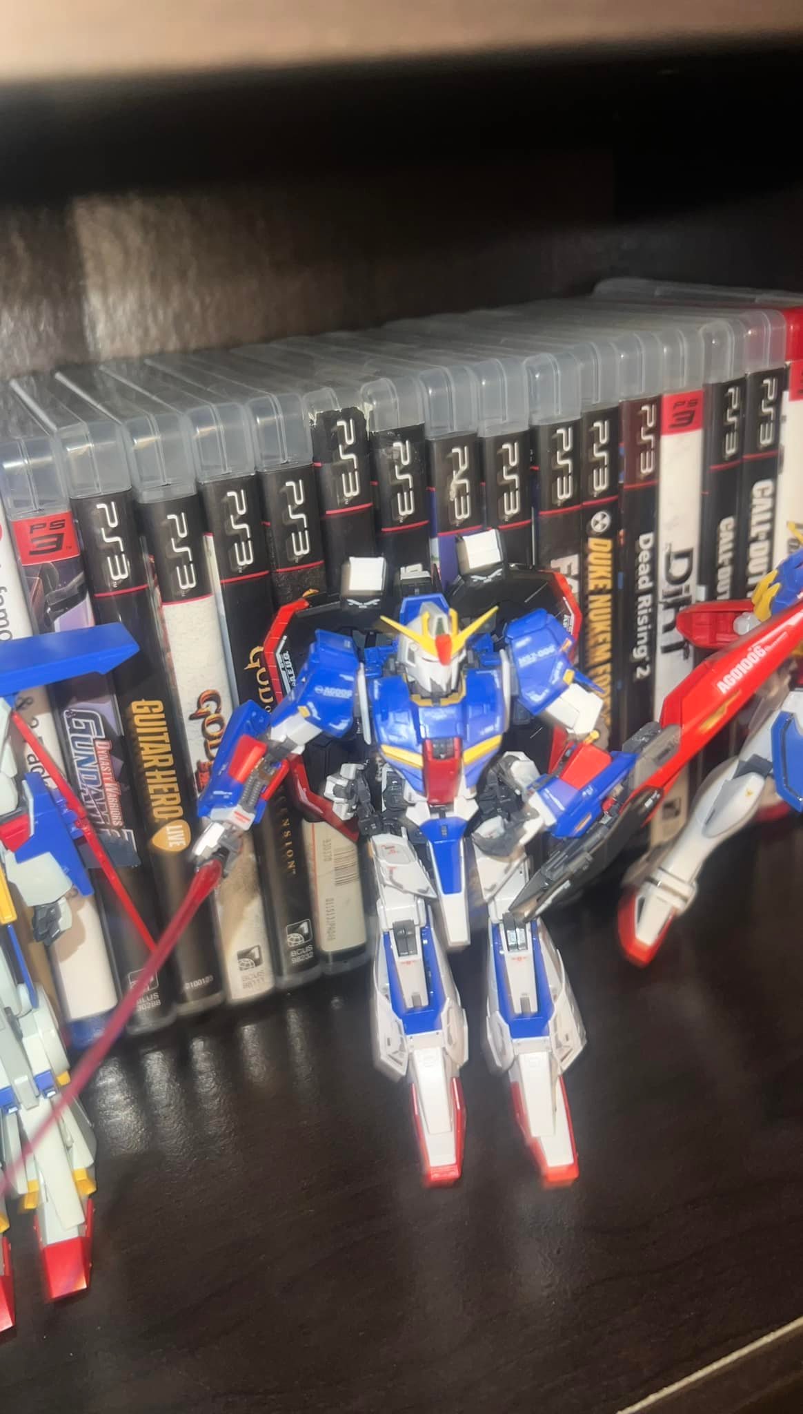 Newest editions to my collection MG Gundam Red Frame and RG Zeta