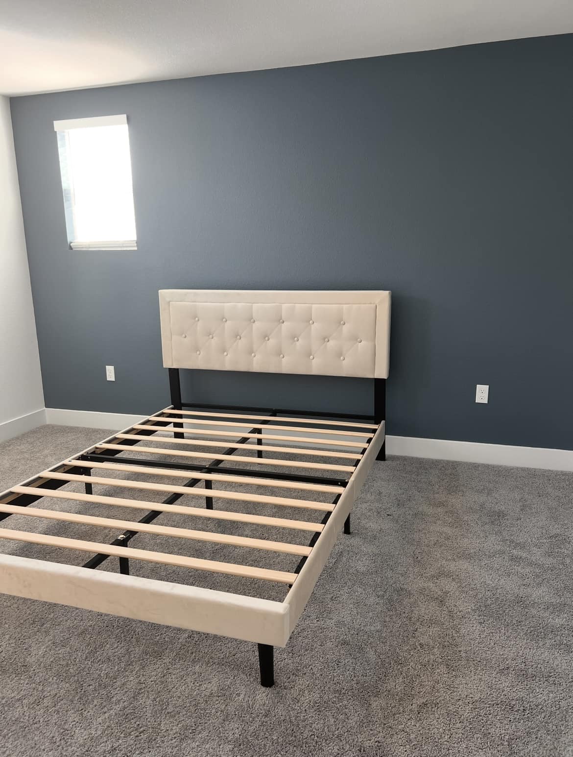 What dresser and nightstand styles go with a beige tufted bed frame?