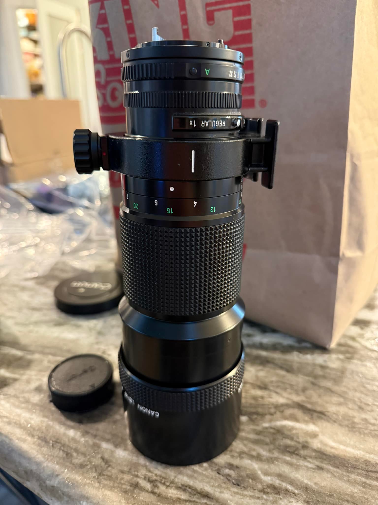How to fix a non-functioning aperture on a Canon FD 300mm F/4 lens?