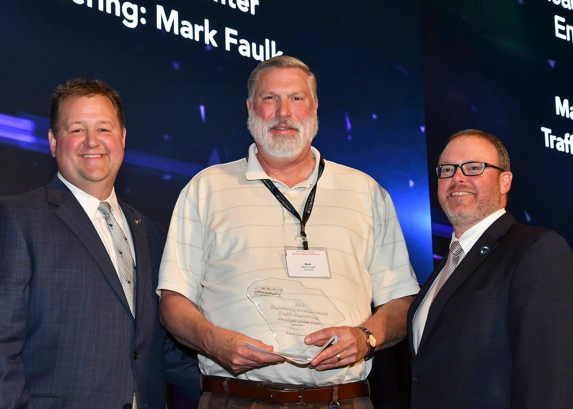 SCDOT - Mark Faulk, center, of the Traffic Engineer receives the award ...