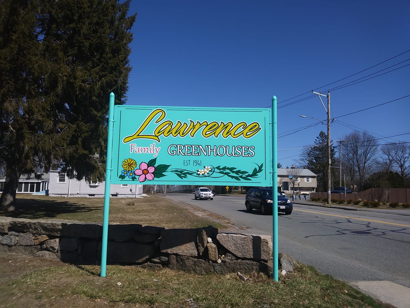 Our locally designed sign is... - Lawrence Family Greenhouses | Facebook