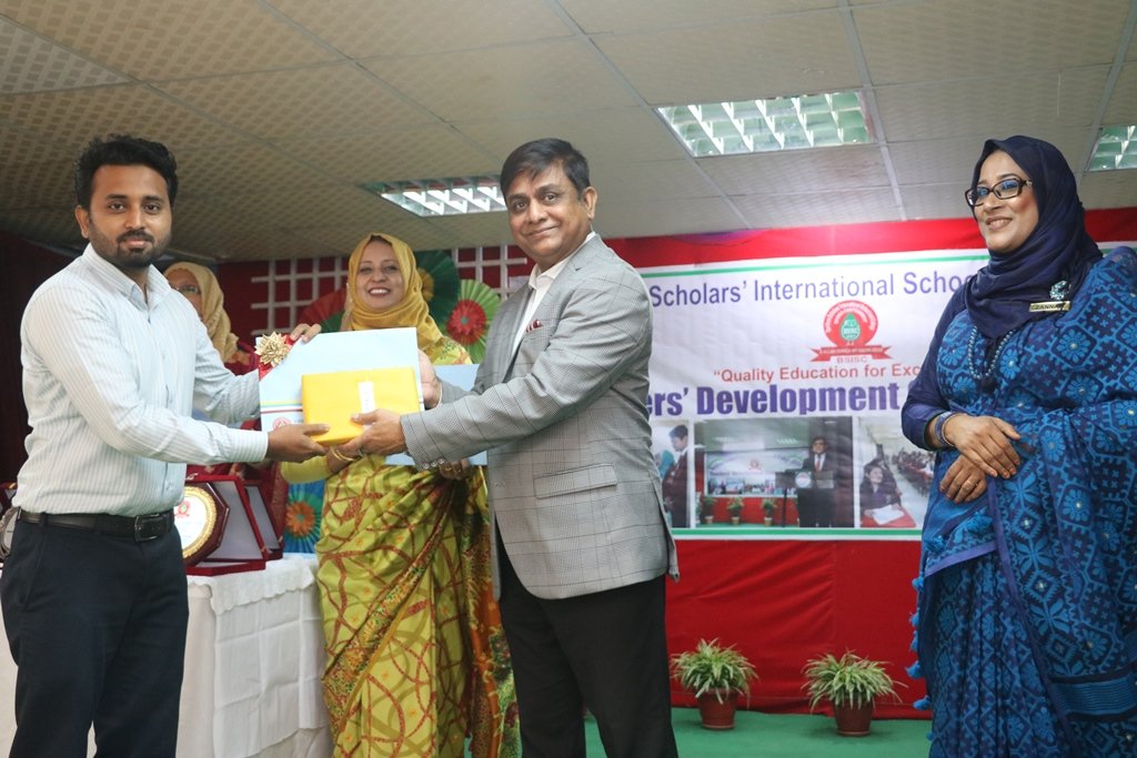 Respected Principal Sir distributed the certificate among the teachers ...