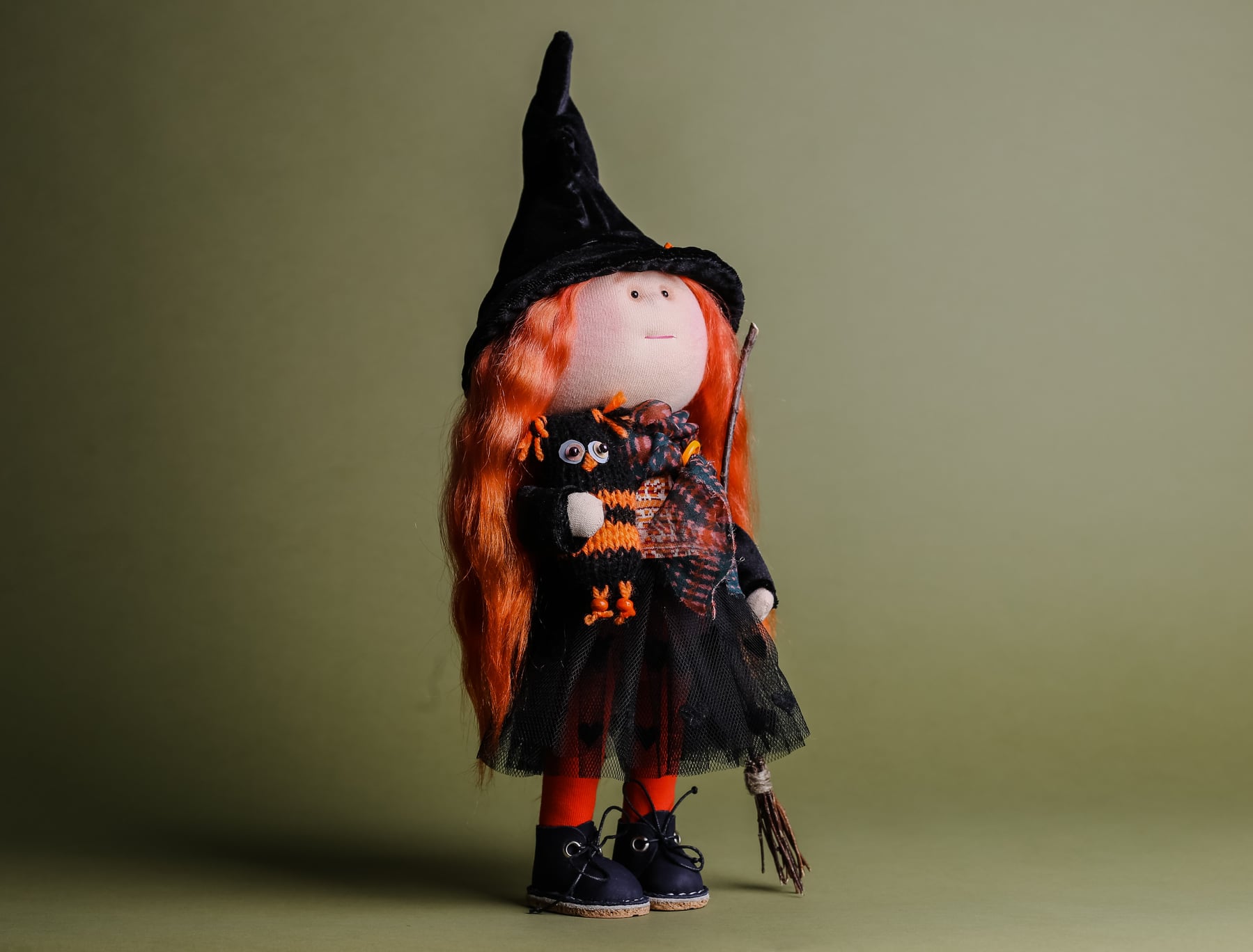 Handcrafted-style plush witch doll features a grey velvet-like hat