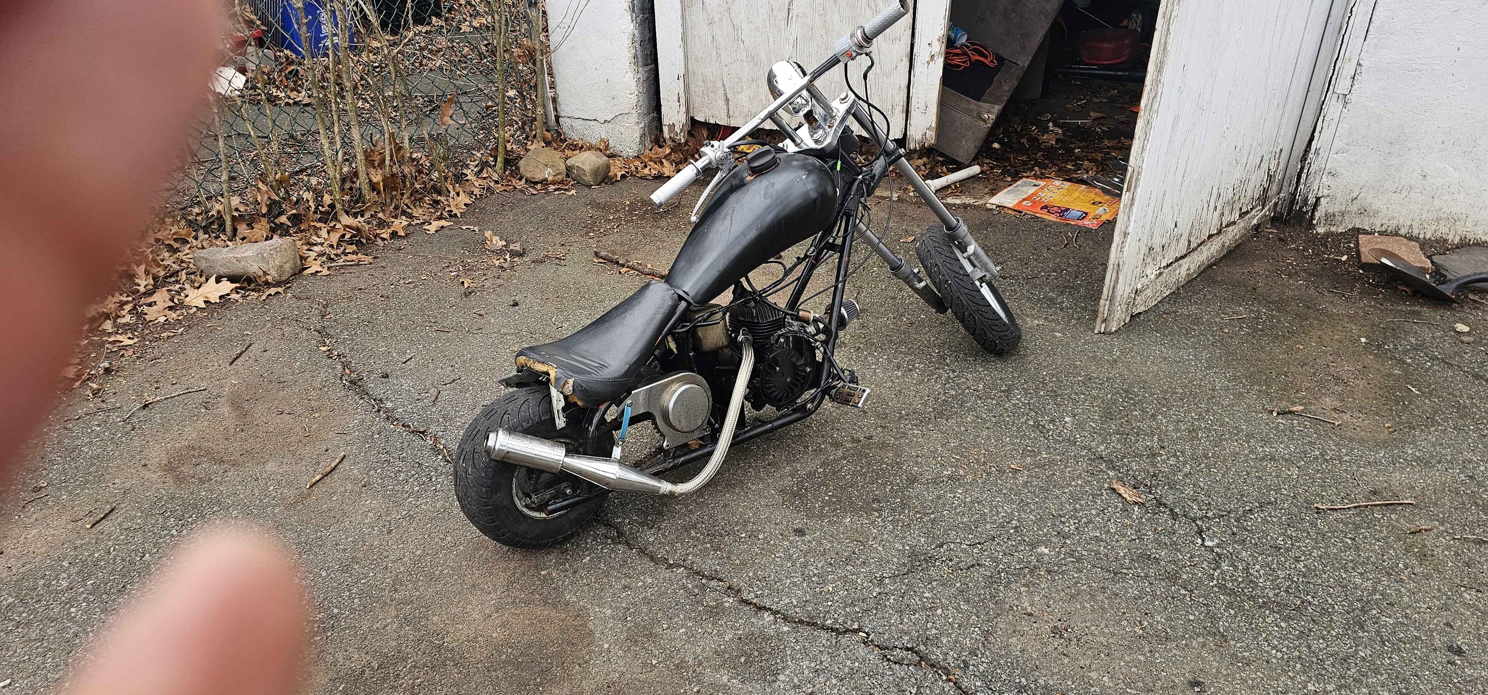 Mini chopper, super fast 70cc engine . Way to fast for my kid. OBO want ...