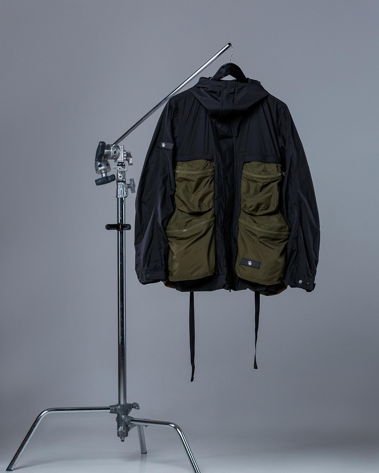 FOR RAINY SUMMER DAYS RIOT DIVISION WRAPPING PARKA WITH SYMBIOSIS 