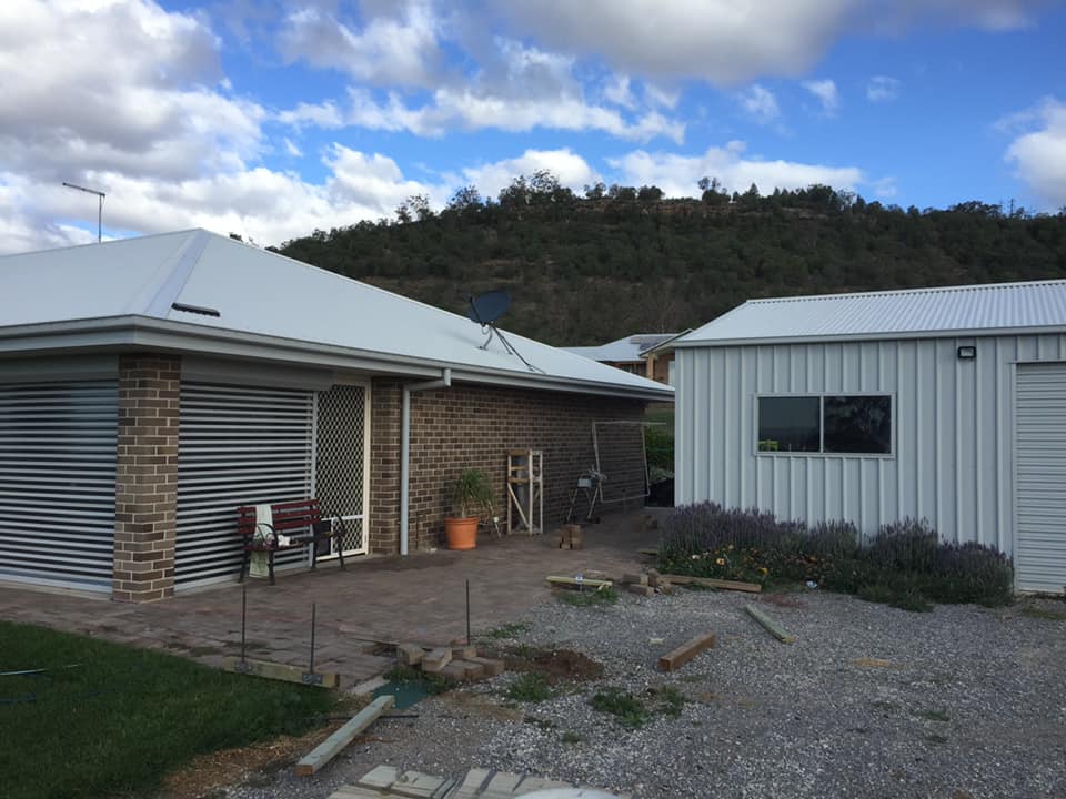 Pergola/under cover area •... - Stuart Carter Building
