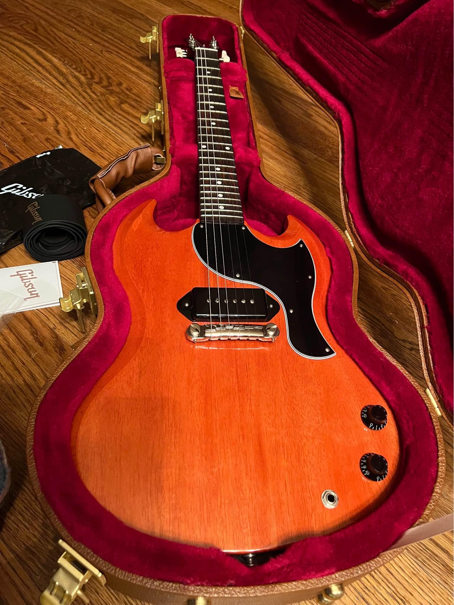 Hold on to your seats as we present a stunning coral pink Gibson