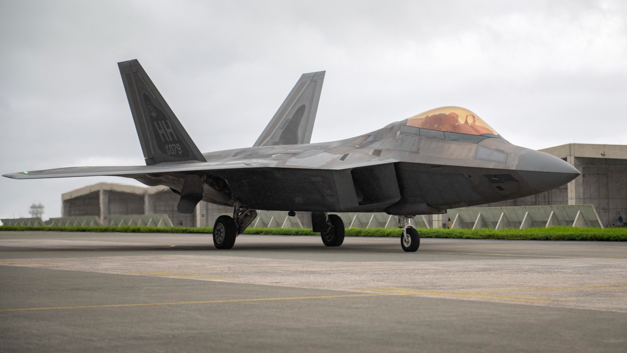 F-22 with drop tanks in transit to Kadena Air Base, Japan, from