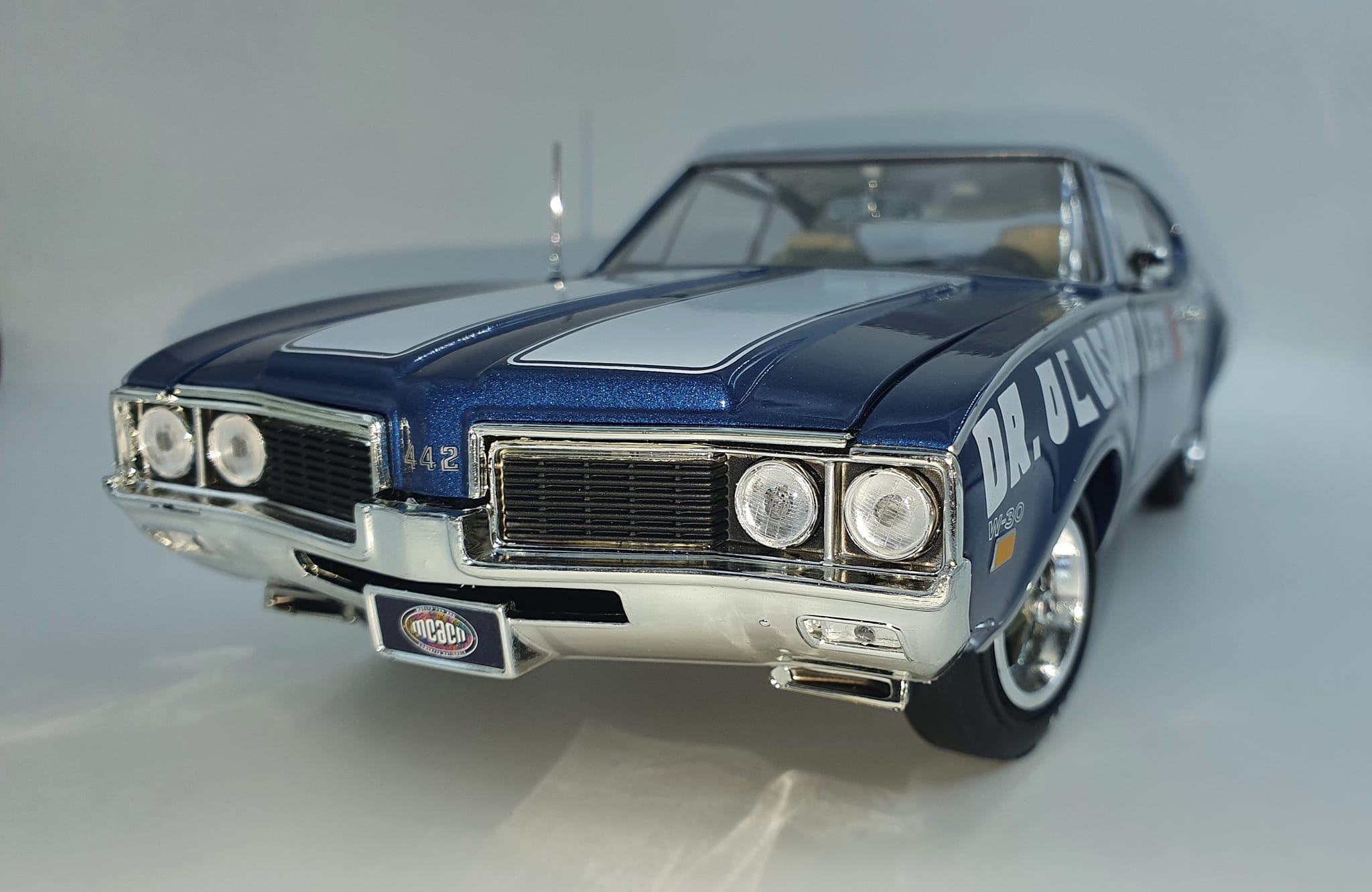 Diecast 1:18 scale model car with detailed interior and engine