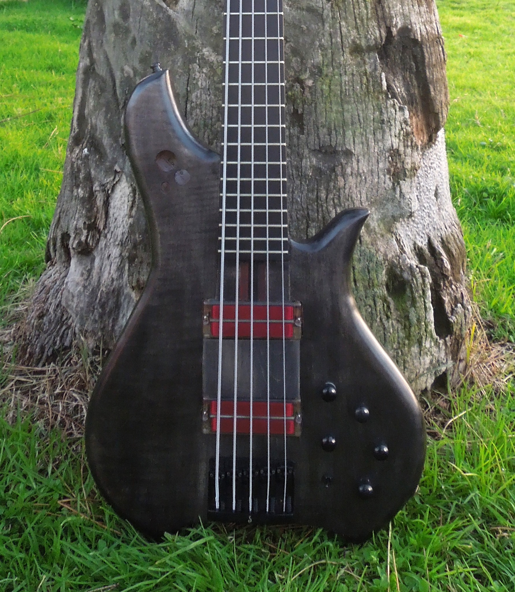 Showcasing custom Bacchus bass guitar
