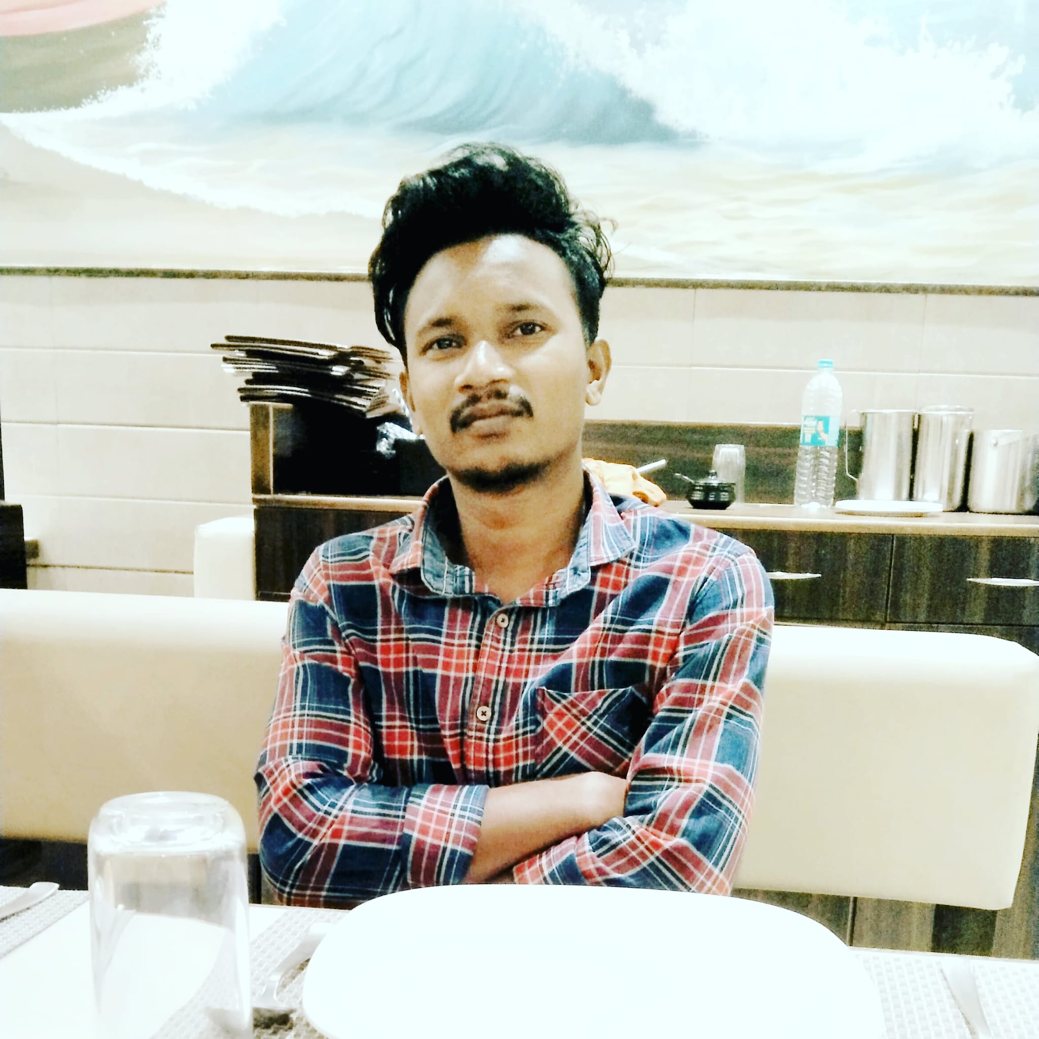 Ajay M