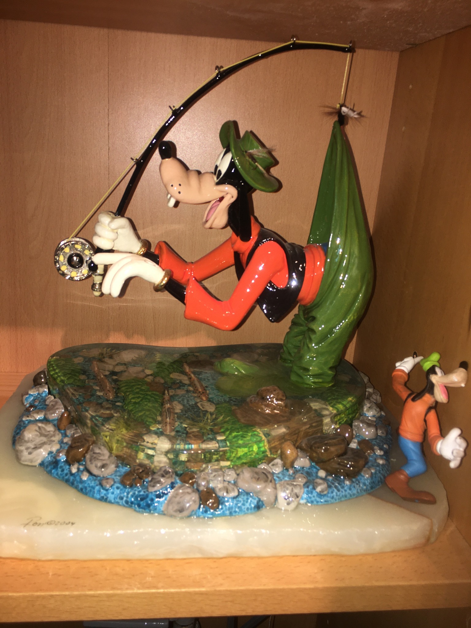 Disney doodle features Goofy fishing at Walt Disney World