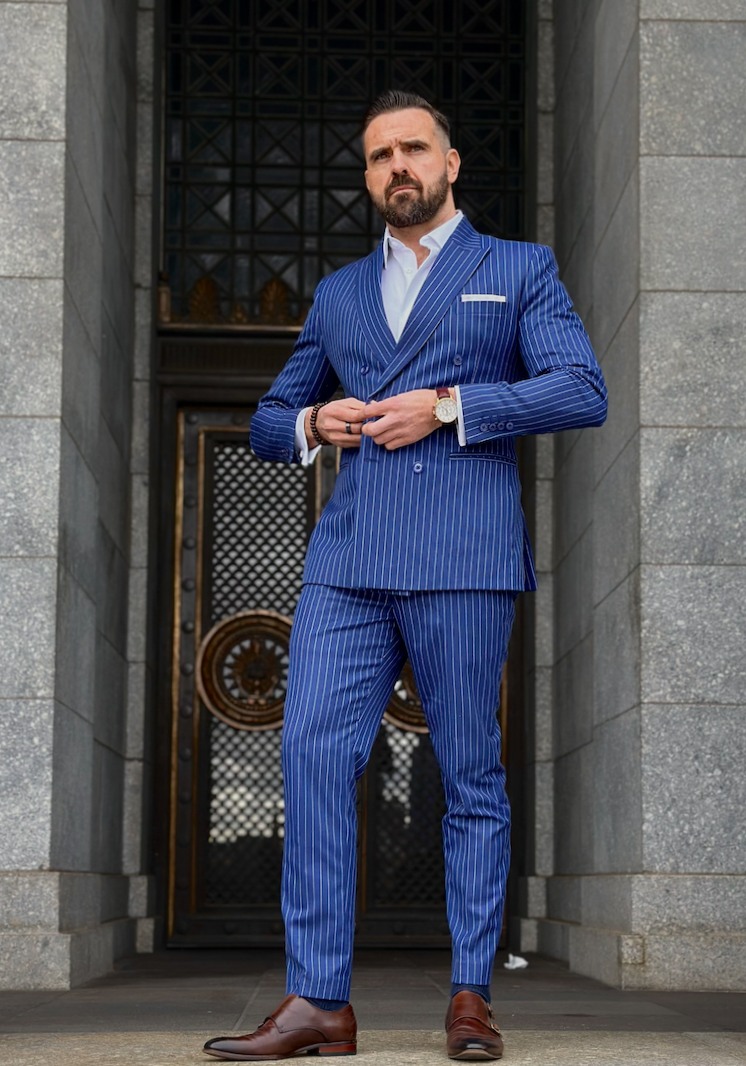 The Navy Pinstripe Suit - An embodiment of timeless elegance