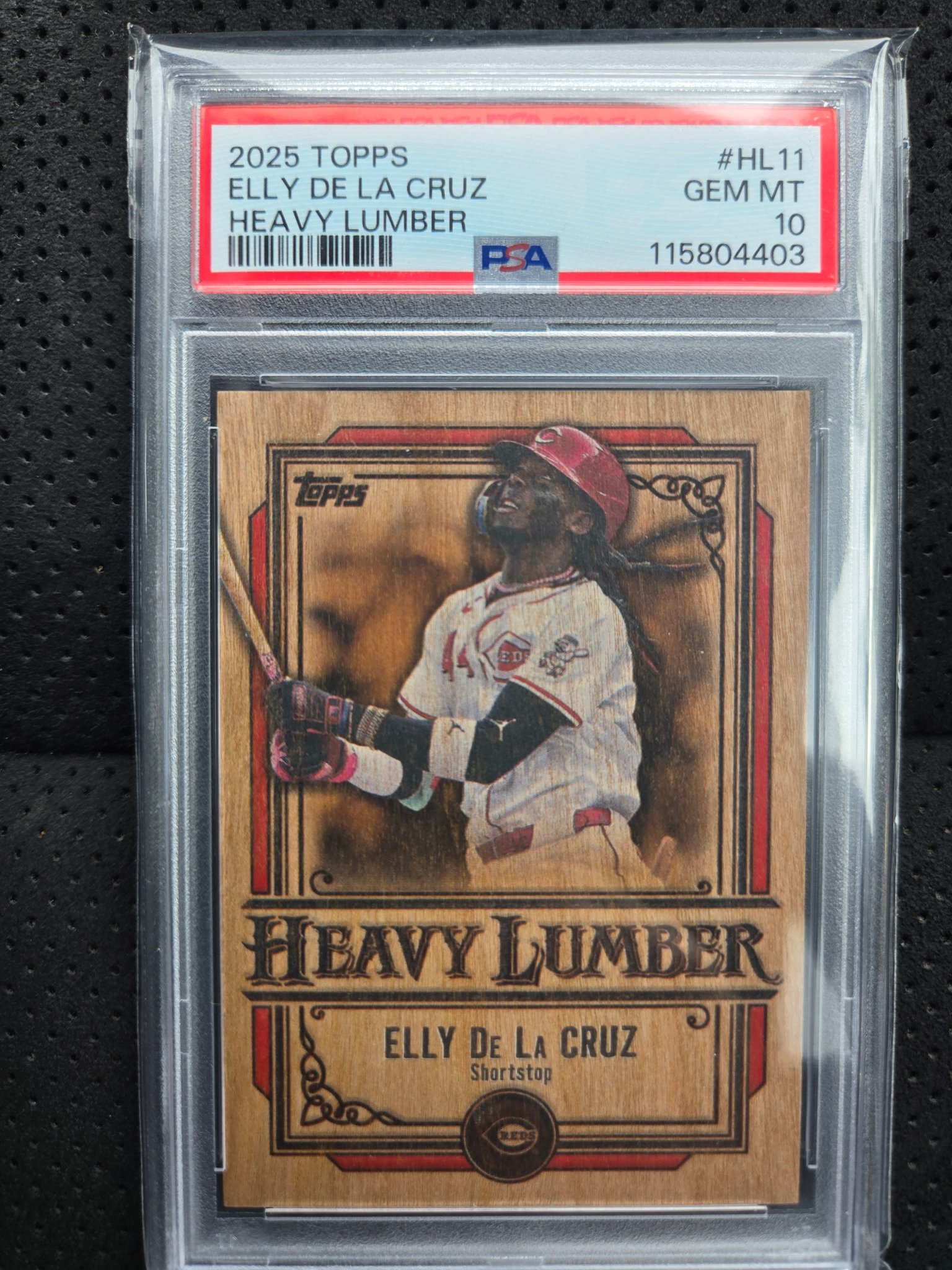 What should I price my 2025 Heavy Lumber 11 Elly De La Cruz card at?