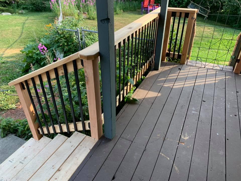 Bigfoot Builders LLC - Custom cedar railing with black aluminum ...