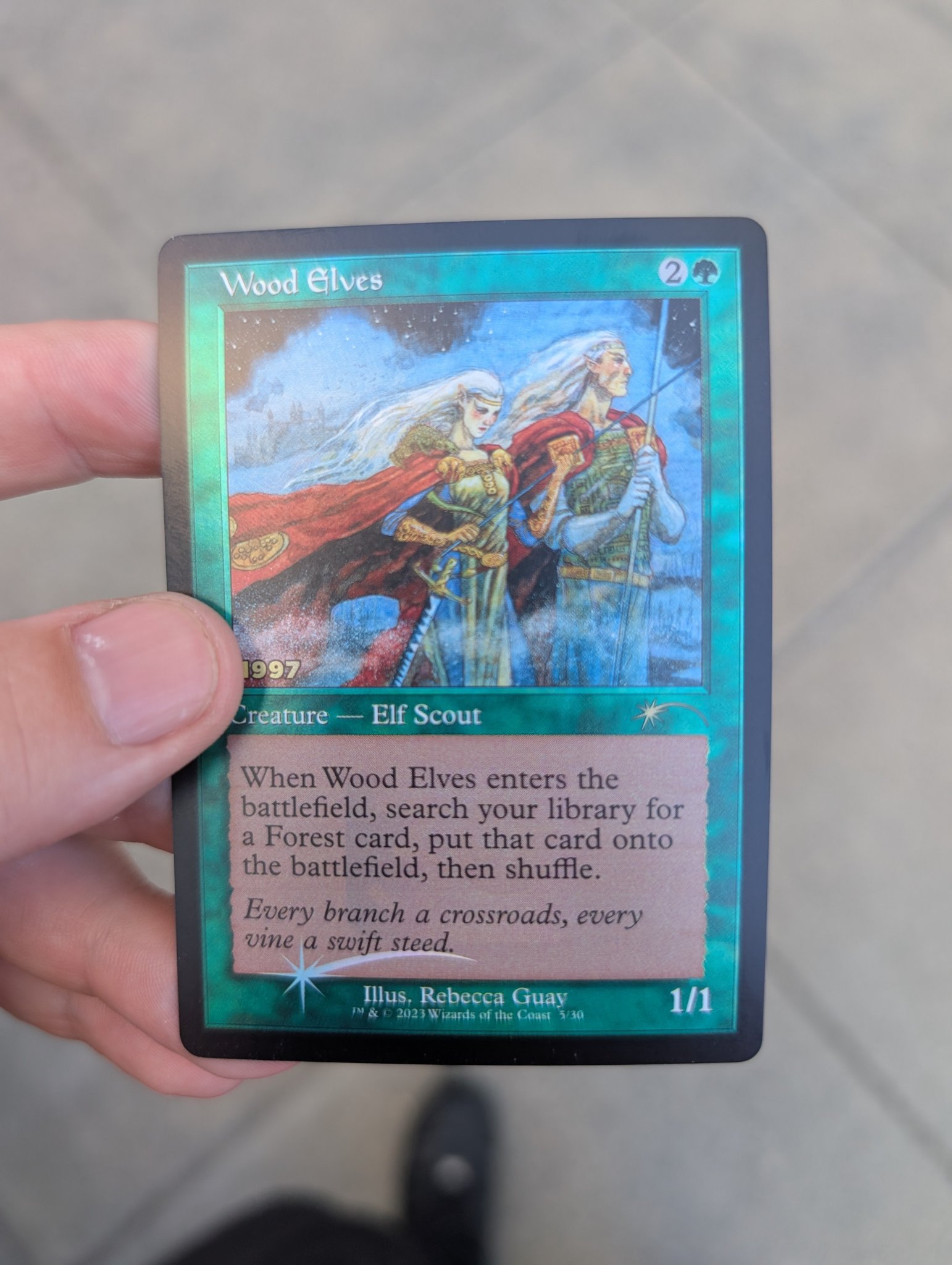 Non-foil & traditional foil Fyndhorn Elves promo cards featuring