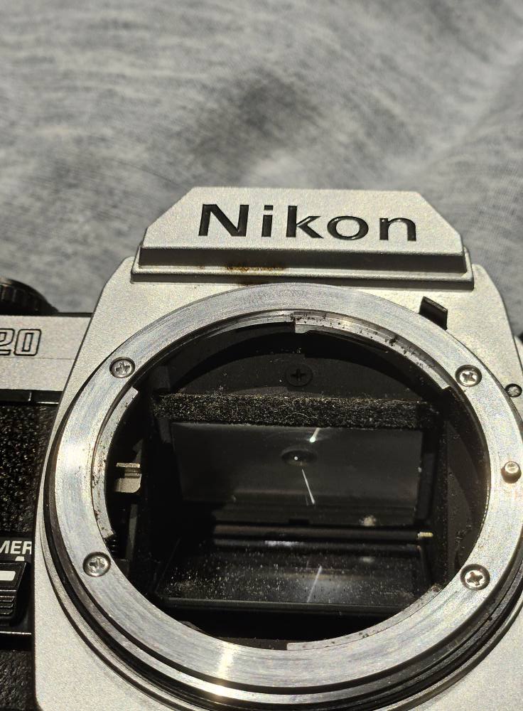 Cleaning mold from vintage camera lens?