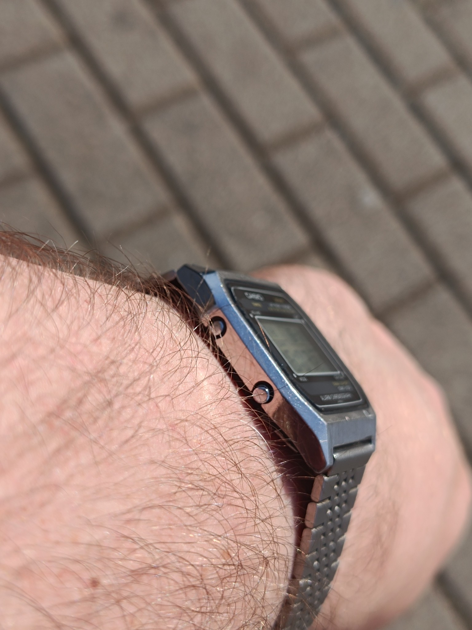 Hi there. Casio A254 from 1982. No epoxy resin, real metal. The