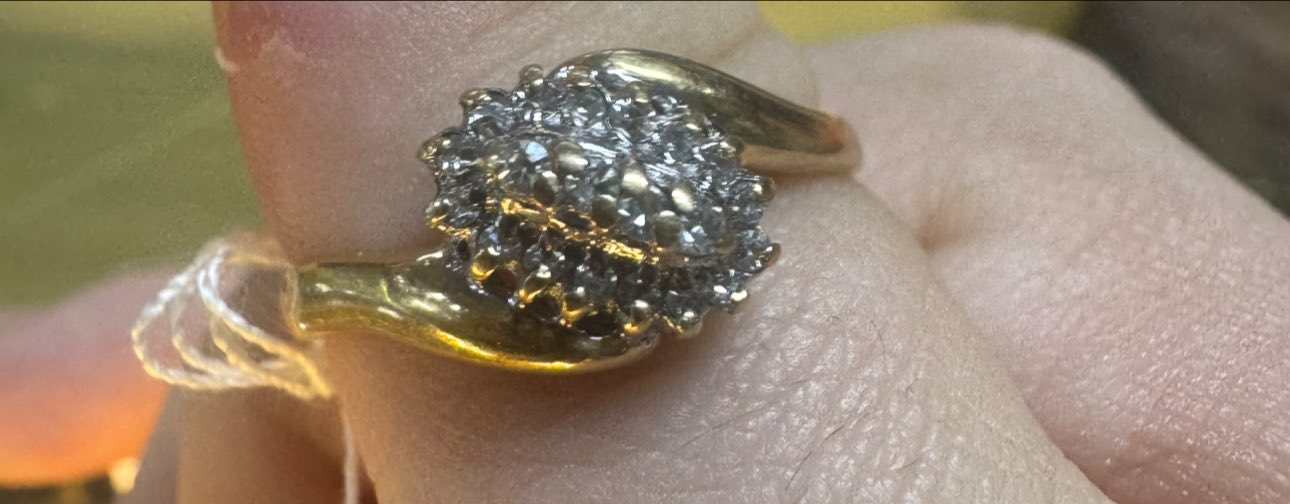 What is the origin and value of a vintage ring with intertwined 